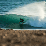 surfing in taghazot enjoying soft waves for biginners and big for pro